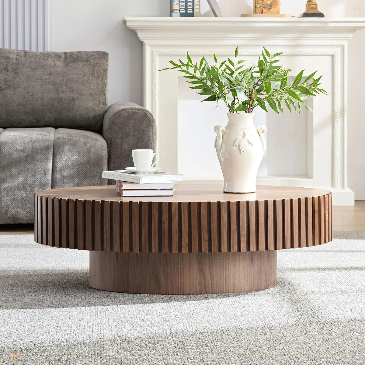 Oval Wooden Coffee Table with Handcrafted Relief | Sturdy Pedestal Base, Olive-Shaped Design for ... | Wayfair North America