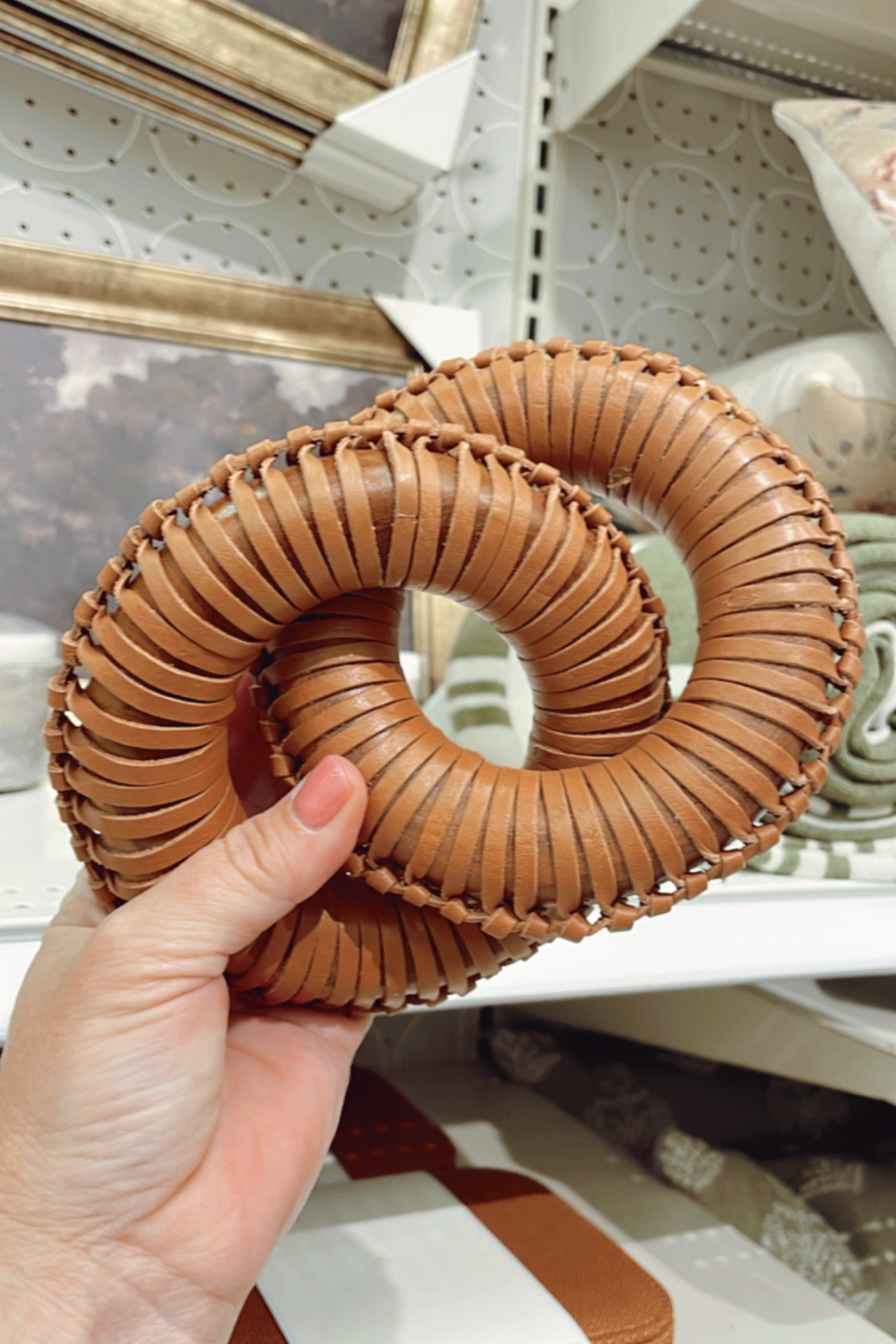 These round leather links make for fun coffee table decor! From Threshold/Studio McGee collection at Target. 

#homedecor #coffeetabledecor #shelfdecor 

#LTKhome