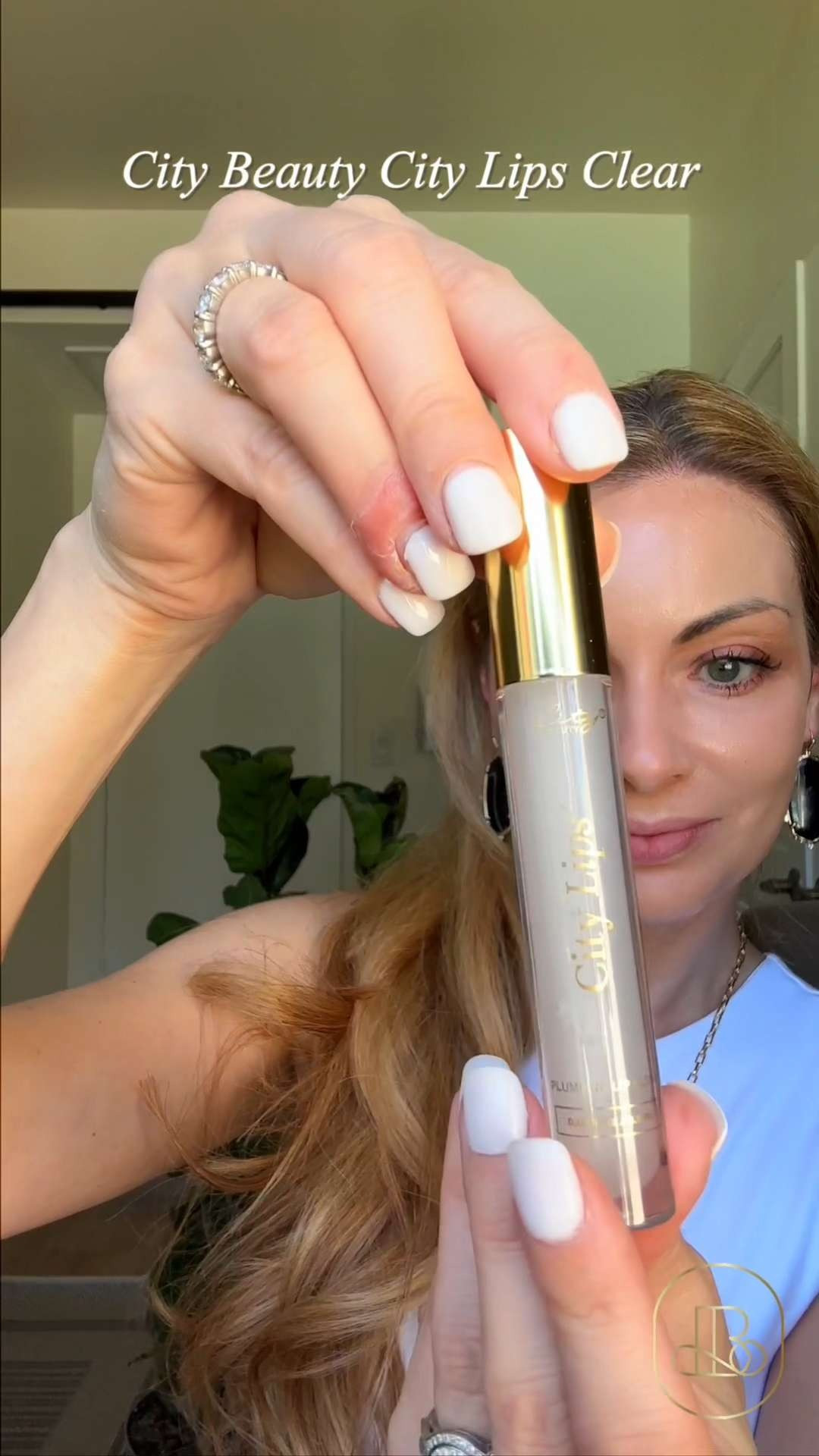 City Beauty City Lips Clear is a cult-favorite plumping gloss that delivers both immediate and long-term results. I love how the hyaluronic acid-infused formula deeply hydrates while smoothing out those pesky lip lines. Great gift ideas for the skincare lover who wants to elevate their "no-makeup" look! 🙌  

#CityBeauty #CityLips #LipPlumper #AntiAgingBeauty #ClearGloss #BeautyMustHaves
 #LTKgrwm #LTKBeauty