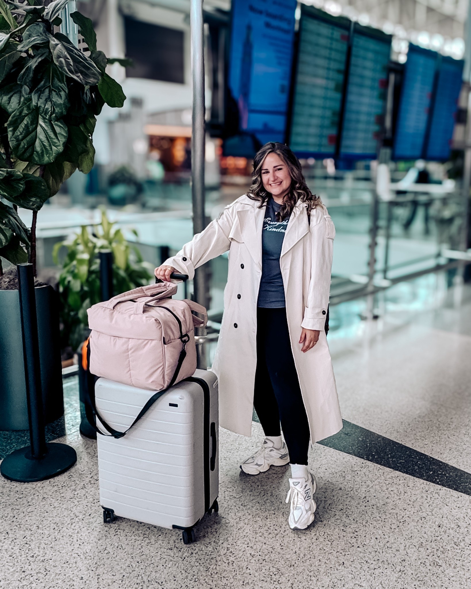 Comfy travel outfit and best luggage! 

Trench coat, black leggings, graphic T-shirt, kindness T-shirt, 9060 sneakers, new balance, leggings outfit, midsize, plus size, petite

#LTKMidsize #LTKPetite #LTKPlusSize
