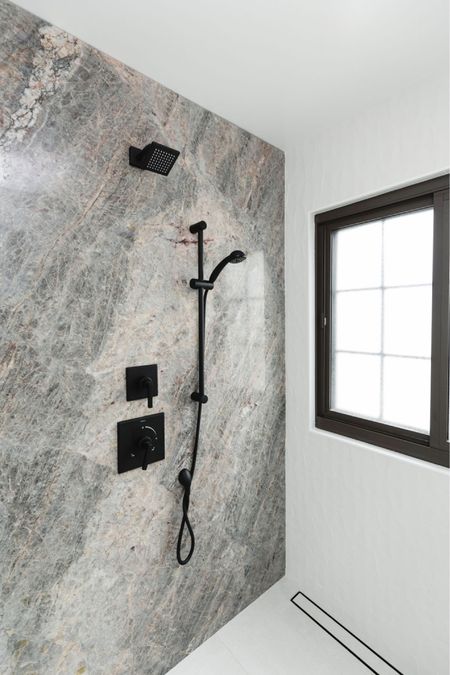 Modern Bathroom 

Sleek tiles, clean lines and streamlined glass doors for a simple, clean design. Walk-in shower, large shower slabs, matte black hardware, primary bathroom, neutral bathroom. 


#LTKStyleTip #LTKHome