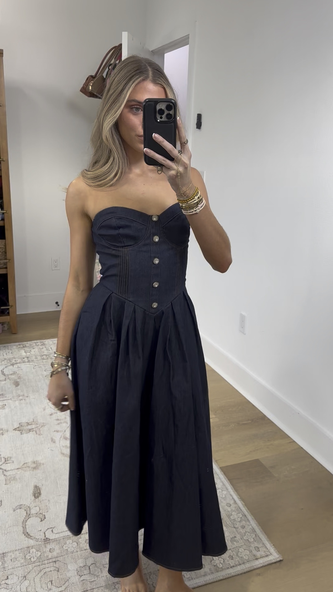 @ladyblacktie size small denim dress. Elevate your wardrobe with the Urban Corset Denim Midi Dress, designed with a strapless sweetheart neckline and a structured bustier bodice detailed with buttons for refined appeal. The basque waist enhances your silhouette, while the full skirt offers graceful movement. Finished with a back zipper closure, this dress blends classic denim with elegant tailoring for a sophisticated, modern look.

#LTKFindsUnder100 #LTKSeasonal #LTKootd