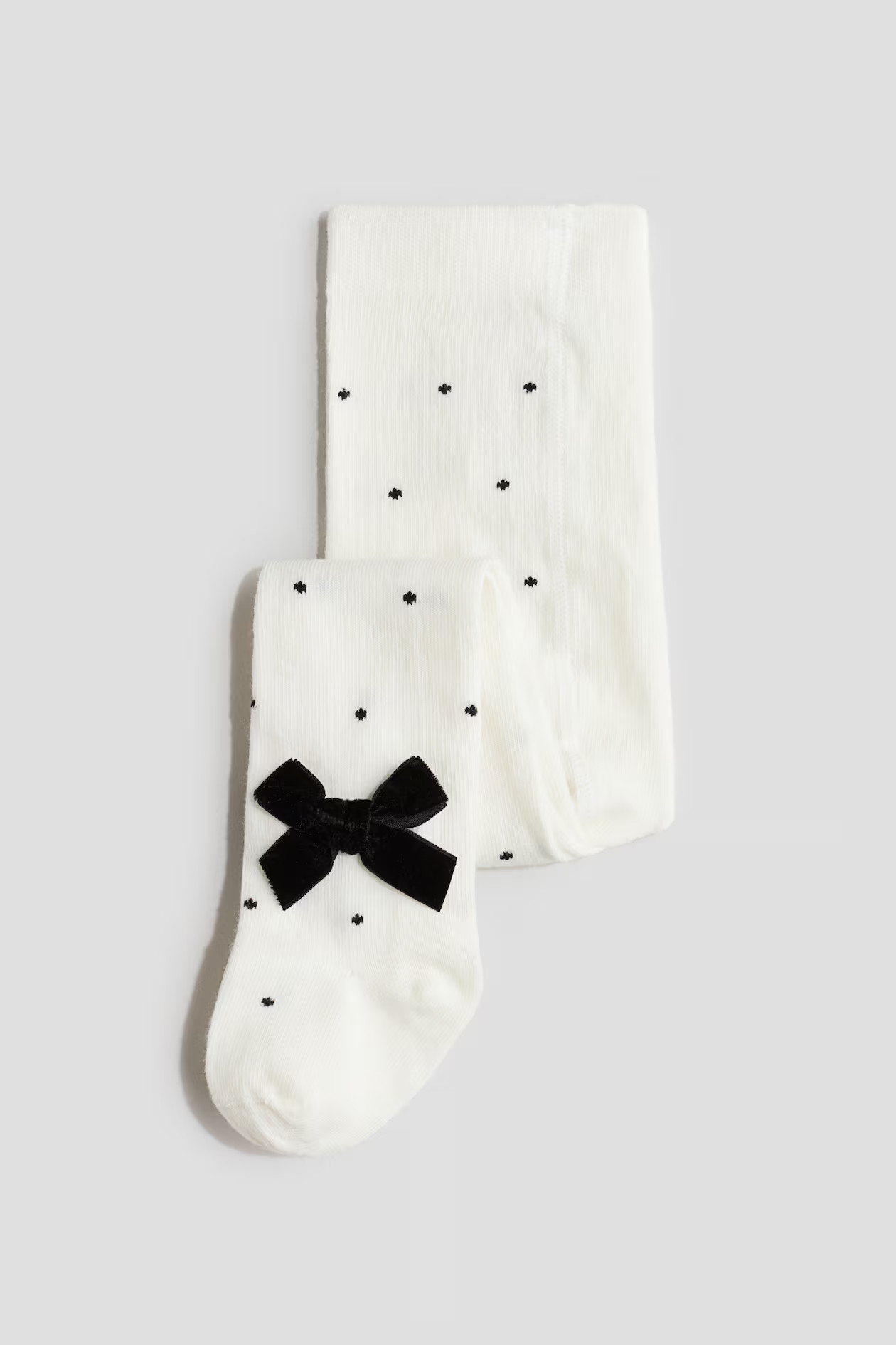 Bow-detail tights | H&M (UK, MY, IN, SG, PH, TW, HK)