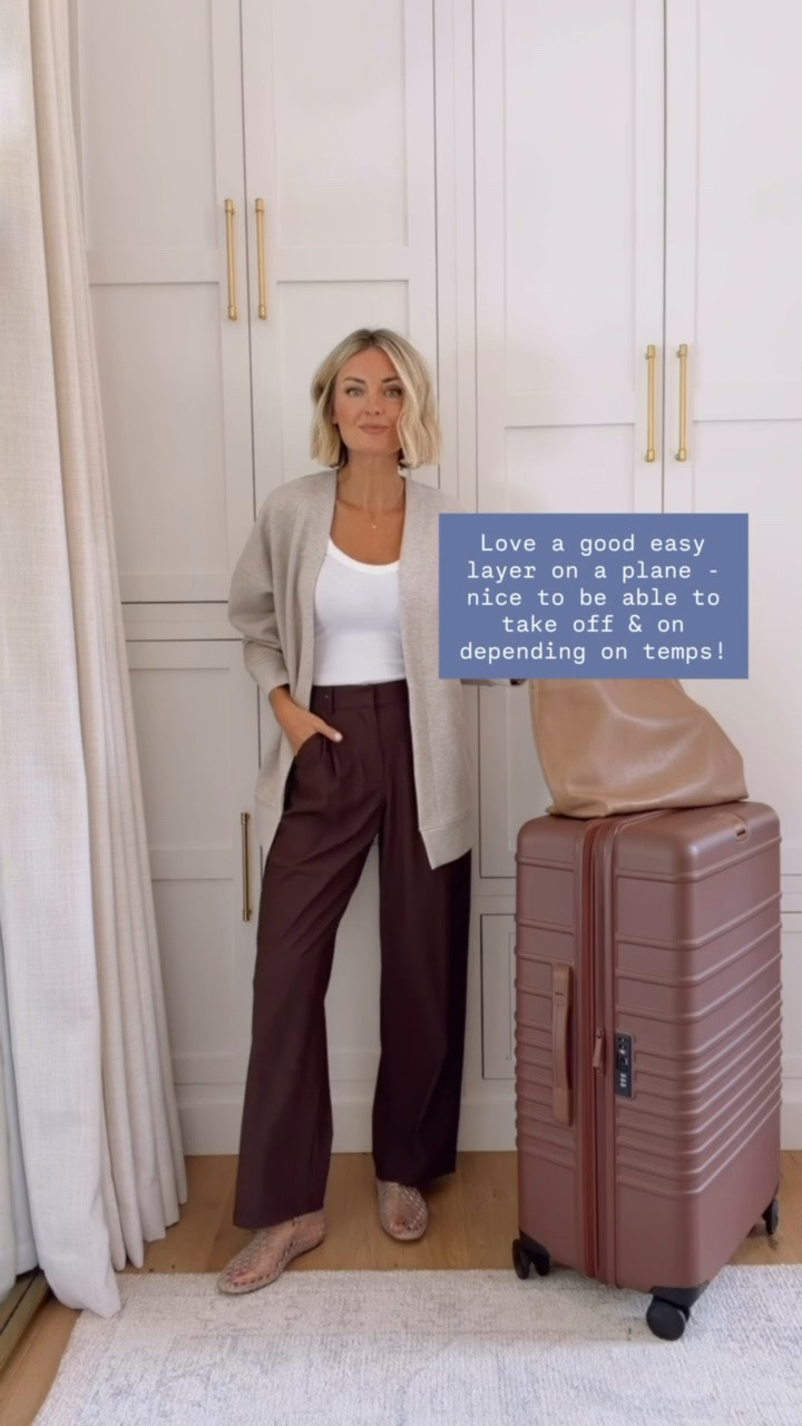 This cardigan & these pants are both an activewear material, so they are super comfortable! Yet, they look so elevated! Wearing S in top/cardigan & XS in pants!

Loverly Grey, Target, airport outfit, travel outfit, Beis, luggage, jelly flats, trouser pants, brown pants

#LTKSeasonal #LTKTravel