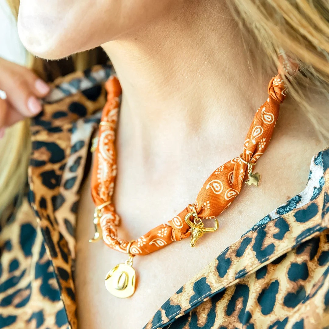 Get your gameday bandana charm necklace or stack from Goldenthread! 🧡