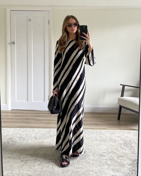 Wearing…

A size 12 in the New Look Black Diagonal Stripe Maxi Dress
I’m 5 ft 6 for an idea of the length

Styling for a holiday look, accessorising with…

Abercrombie black raffia bag 

Hermes chypre sandals

Bottega sunglasses


Holiday outfit, beach look, summer outfit, maxi dress, dress

#LTKSeasonal #LTKeurope #LTKsalealert