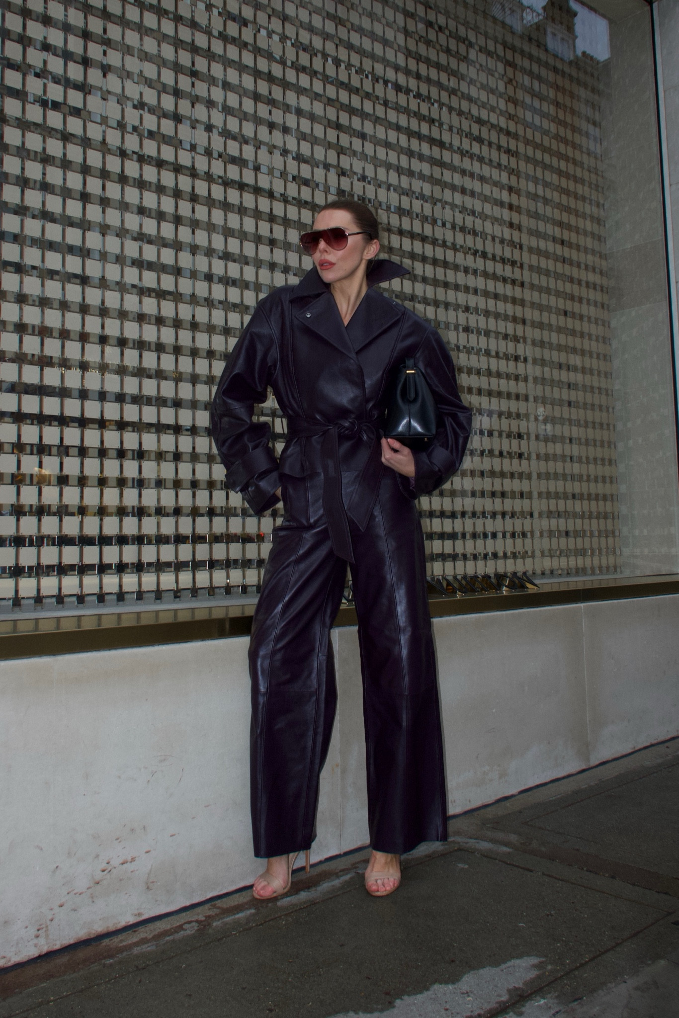 This look features a rich purple leather trench cinched at the waist for a sleek, tailored finish, paired with matching wide-leg trousers for a bold, monochromatic moment. Styled with oversized sunglasses and a structured black bag, it’s the perfect mix of modern luxury and effortless street style—ideal for making a statement this season.

#LTKeurope #LTKwinter #LTKuk