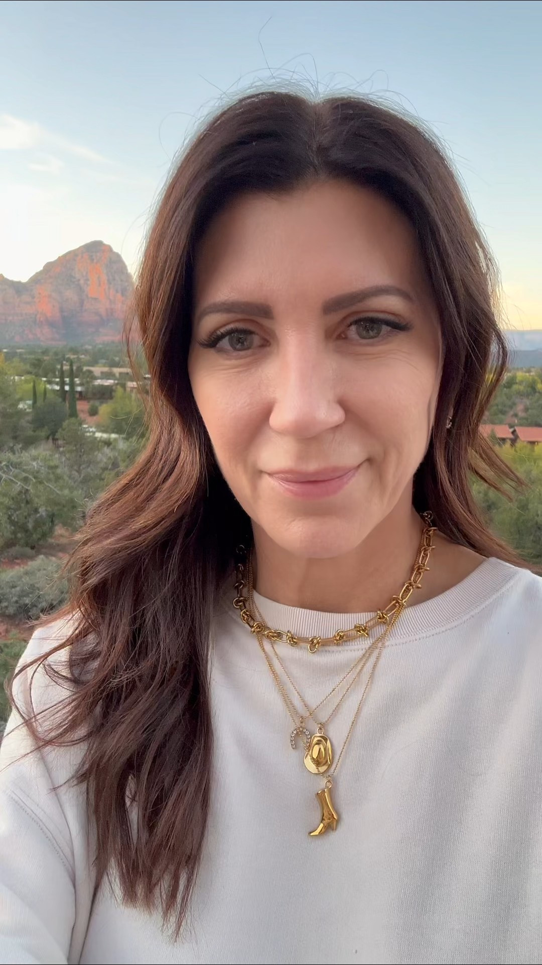 Everyone loves my cowgirl layered necklace with the horseshoe, cowboy hat and boot. I added an extra chain to mine to bulk up the overall look  

#LTKSaleAlert #LTKGiftGuide #LTKStyleTip