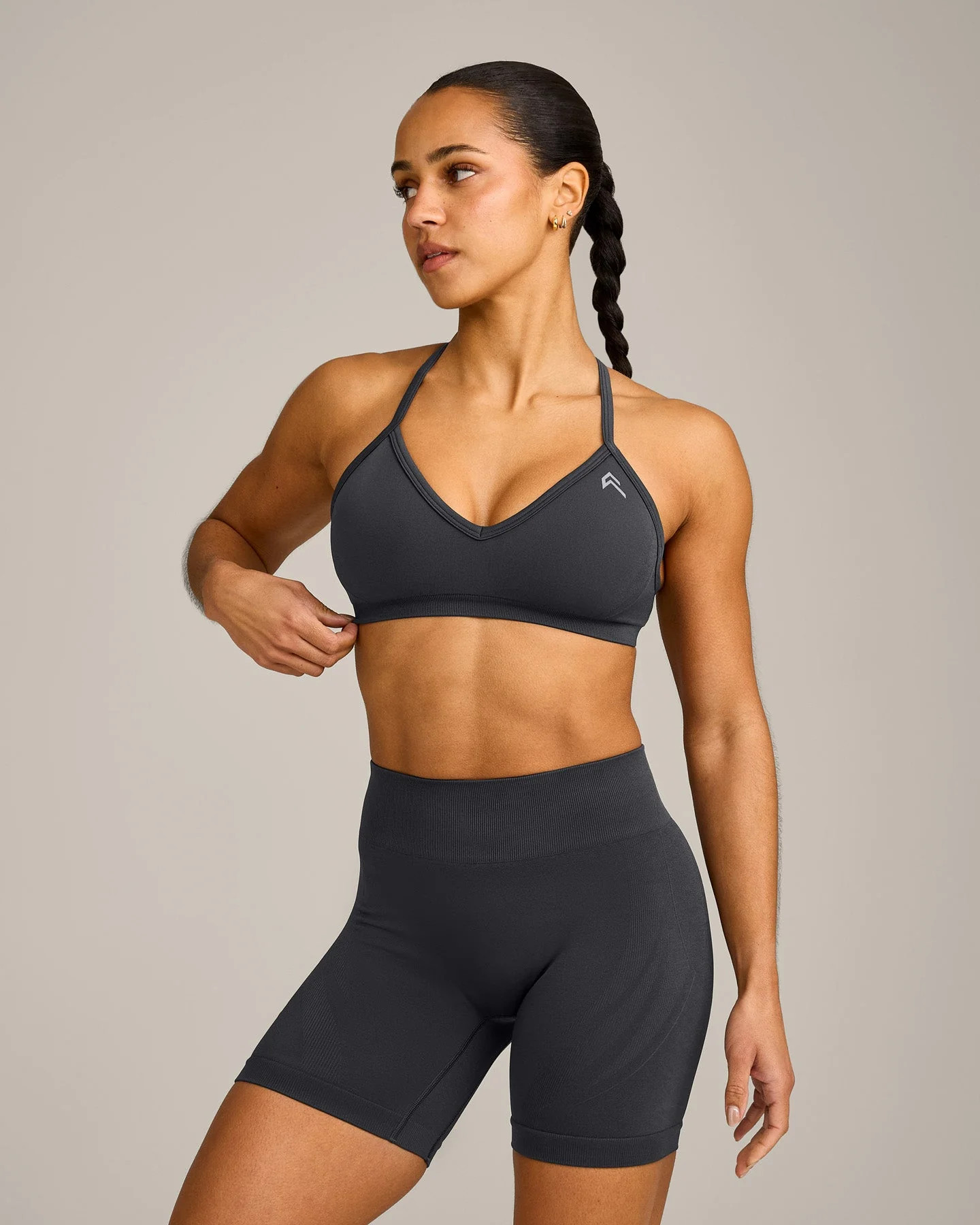 EnhanceLift\u2122 Seamless Strappy Sports Bra with Gray Logo | Coal | Oner Active (UK / US)