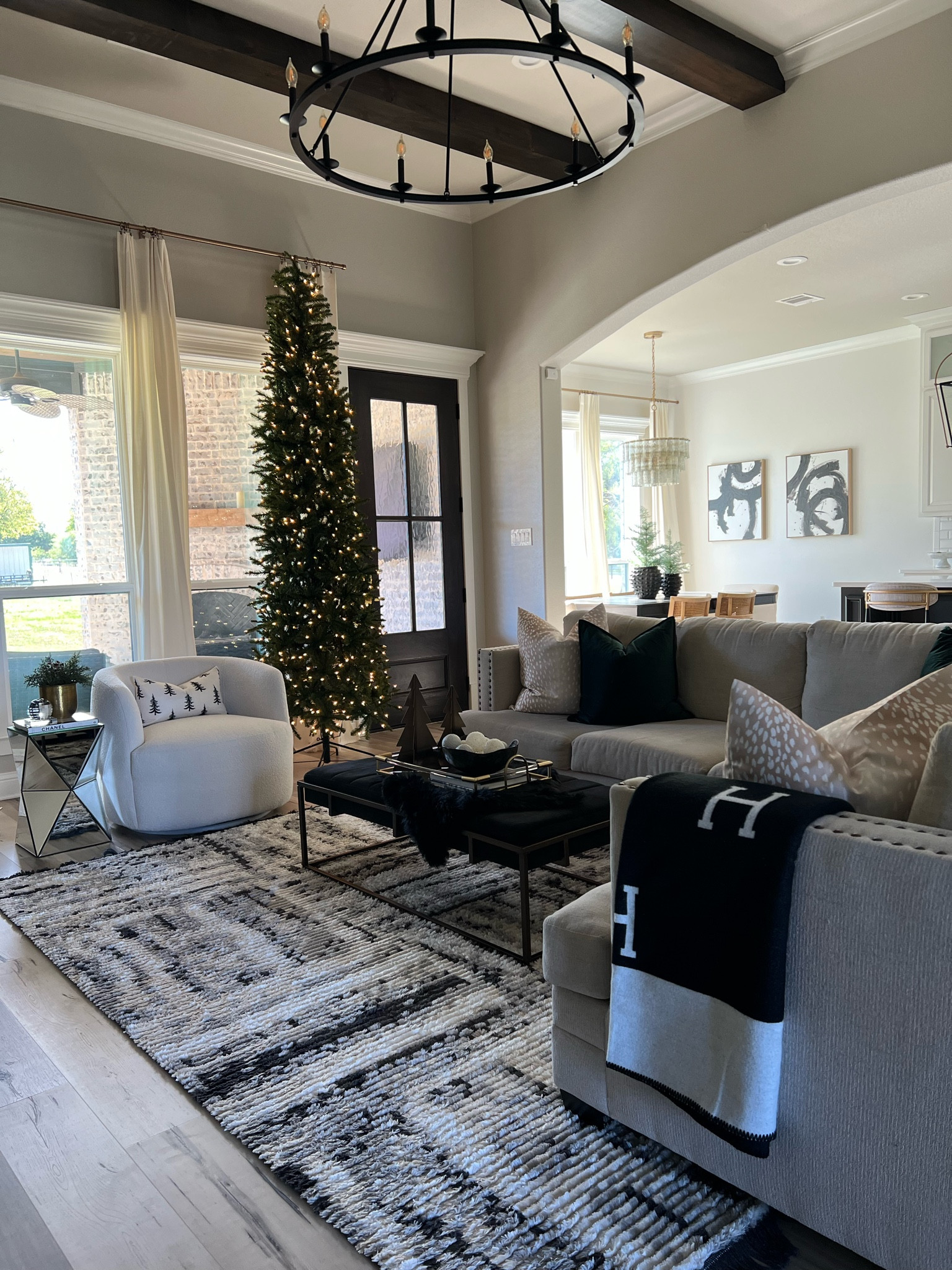 Christmas decor, Christmas home, Christmas tree, 10 foot pre lit pencil Christmas tree, black and white, antelope print pillow cover, green velvet pillow cover, Amazon Home, boucle chair, holiday decor, velvet ottoman, mirrored table, brass, gold

#LTKhome #LTKSeasonal #LTKHoliday