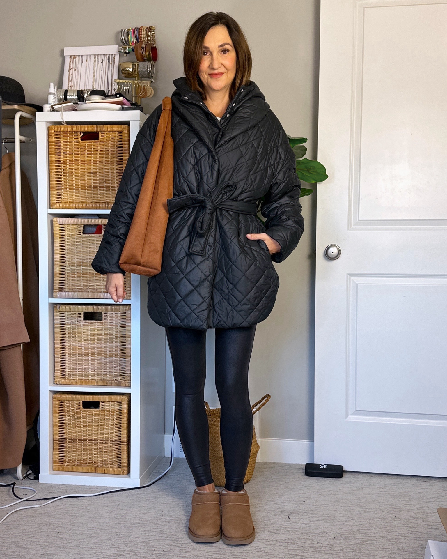 Comfy but elevated - which is pretty much the goal of most of my outfits!
I’m 5’ 7 size 4ish 
Sized up to M in the fleece lined faux leather leggings (I find them more comfortable than the S, use code CBSTYLEDXSPANX for 10% off) and in the quilted jacket (I wanted a roomy fit). Got XS in the slouchy free people sweatshirt, it fits big. Uggs only come in full sizes and I’m 7.5 and I prefer the fit of size 7 over size 8, a shoe horn helps get them on!
The bag is faux suede and such a good size. Tanks fit tts


#LTKshoecrush #LTKstyletip #LTKitbag