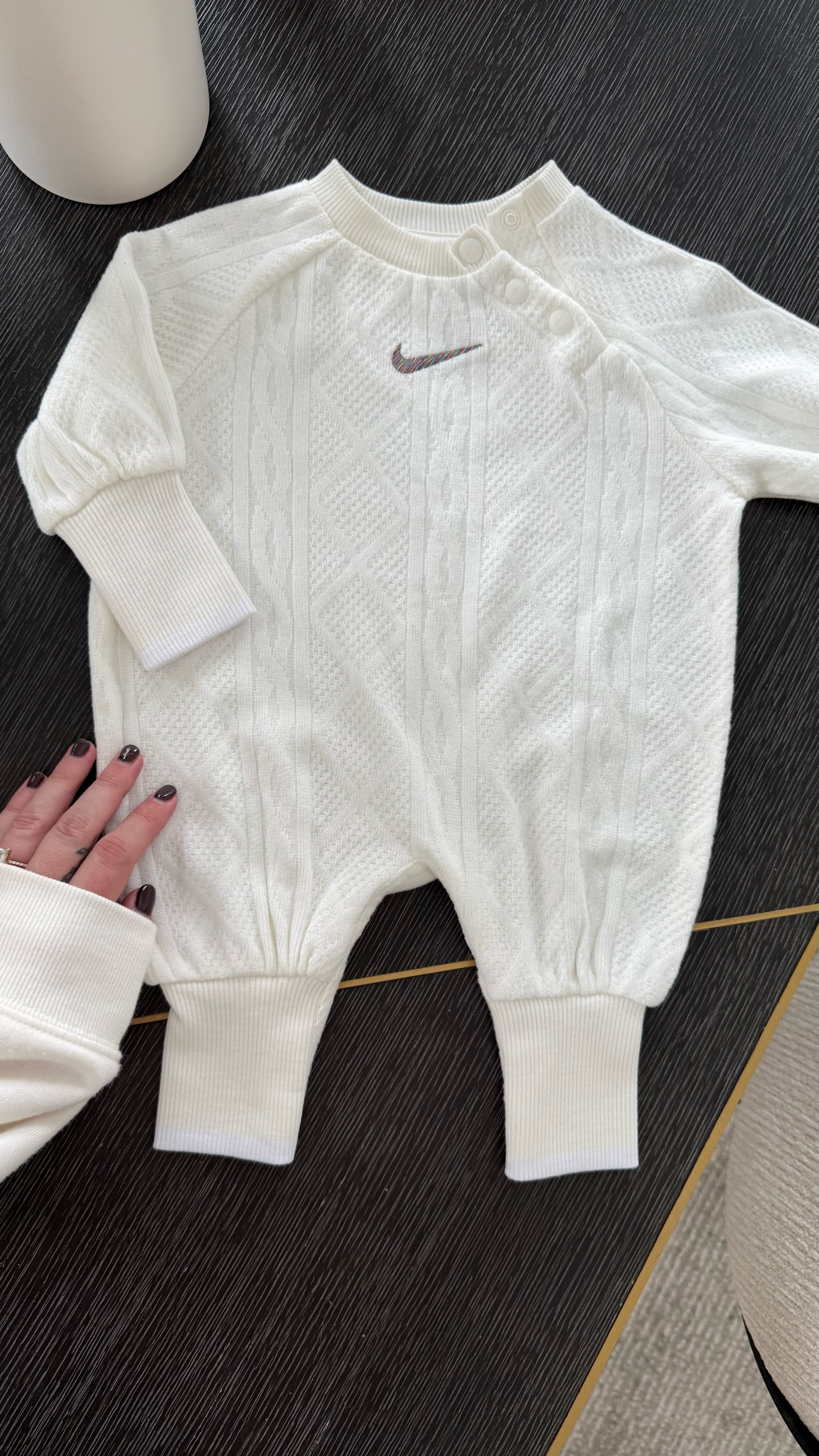 A cable knit Nike baby onesie 😭 My dream 

#LTKBaby #LTKFamily #LTKKids