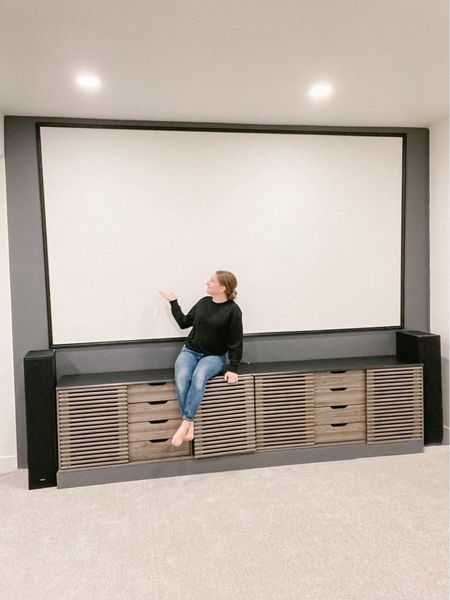 I love how my home theater turned out! Projector screens are pricey so I painted the wall and framed it out. Don’t worry, I linked one in case you just want to just buy one :) All the links below. Follow me on Instagram to see how I made this!

#LTKfamily #LTKhome