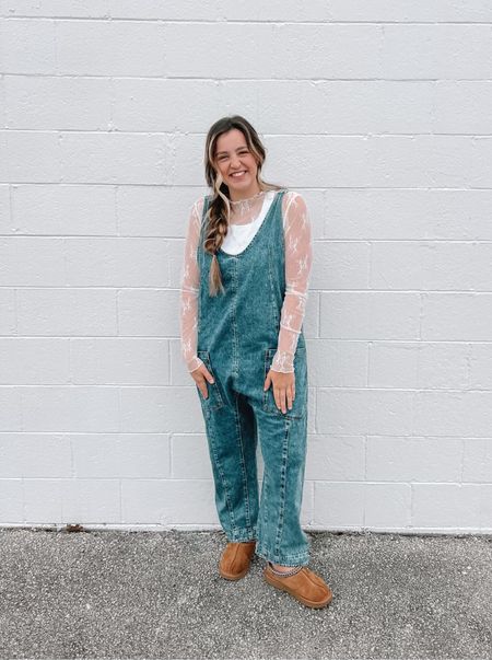 Free people overalls with white lace top. Adds a bit of dressy without losing comfort.

#LTKstyletip #LTKtravel #LTKshoecrush