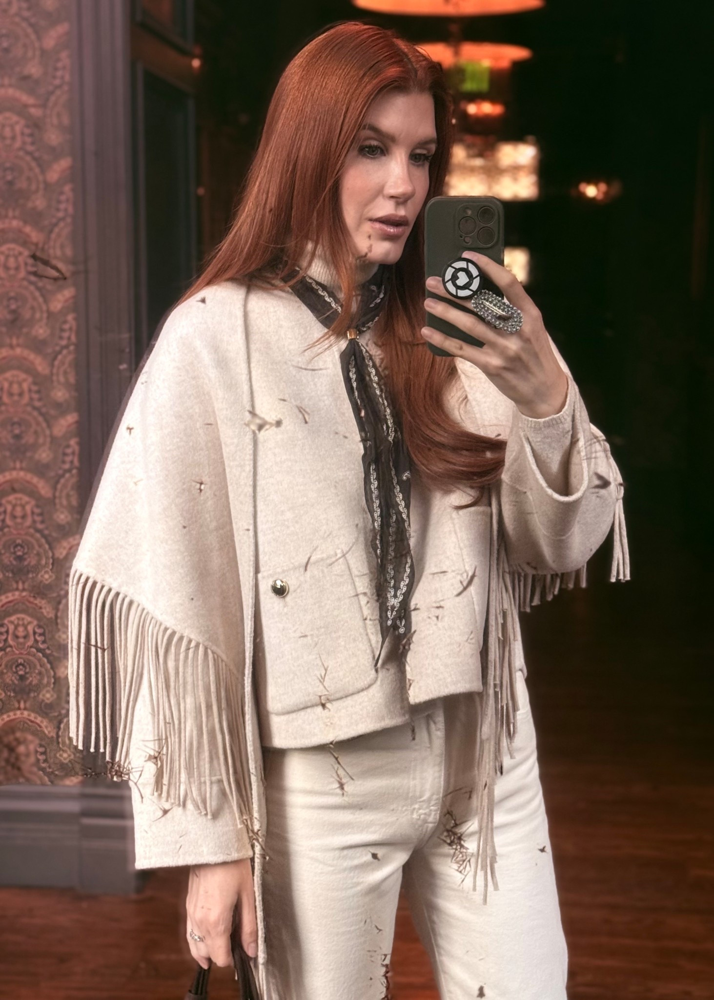 A closer look at the details of my new fringe jacket. Worth the add to cart. 

#LTKootd #LTKgrwm #LTKTravel