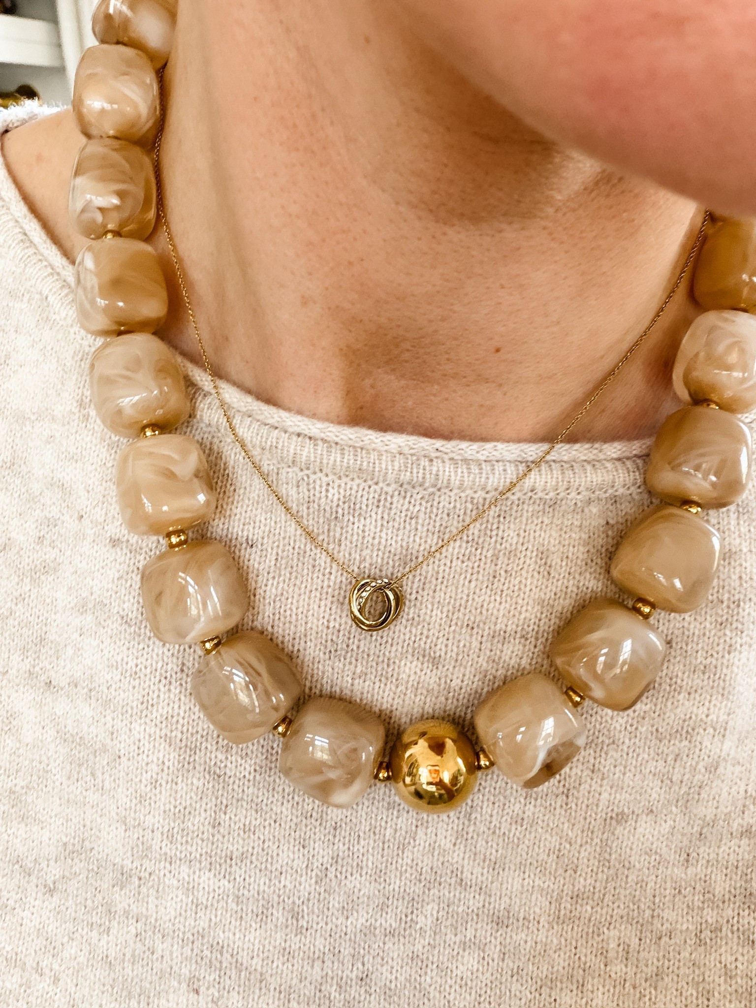 I have been loving statement jewelry! You can buy of these pieces for under $50 total! The neutral colors make the perfect versatile layering look  