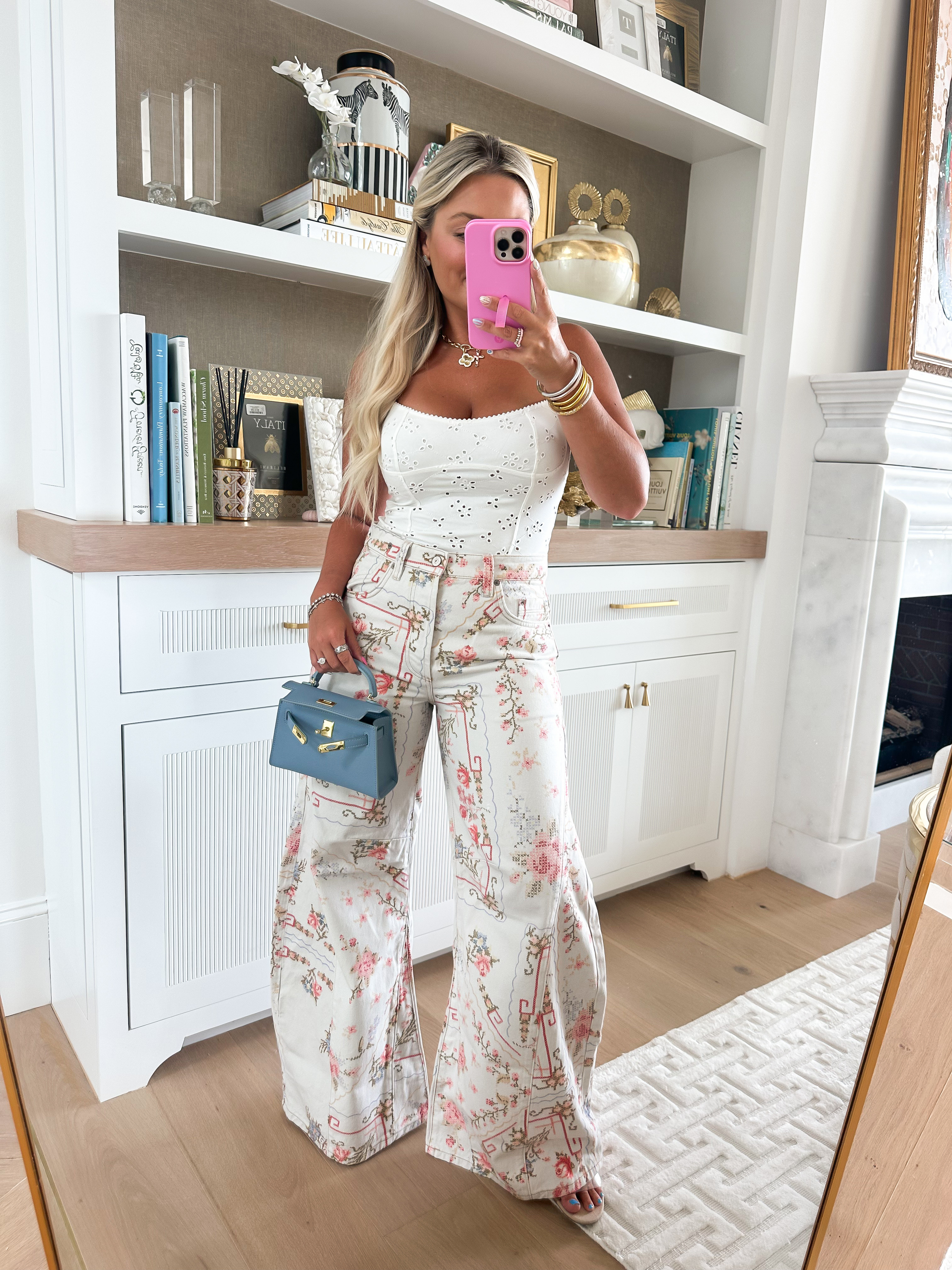 Free People try on haul floral denim pants / wearing size small top and 27 SHORT jeans - they do run small  

#LTKStyleTip #LTKFindsUnder100 #LTKPetite