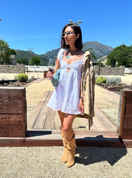 Mini dress, sundress, cowboy boots 

Exact dress is the Weston by For Love & Lemons. Sold out on their website, but linked similar.

#LTKSeasonal #LTKStyleTip