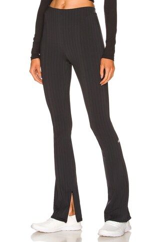 alo High Waist Pinstripe Zip It Flare Legging in Anthracite & Black from Revolve.com | Revolve Clothing (Global)