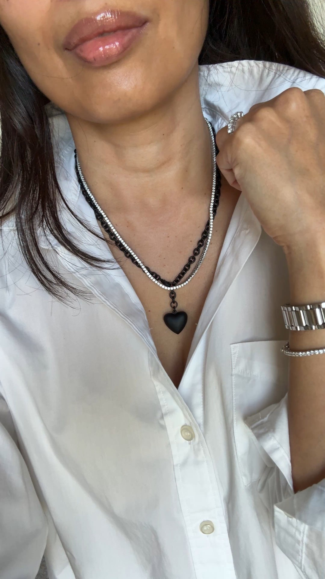 New necklace styled 4 ways  
I love the edgy chic look to this matte black heart necklace. Especially against a white top. 
Pairs well with:
-silver (necklace shown is the same style)
-gold (charm necklace shown is my most worn lately)
-pearls (for a more feminine vibe. Code Naomi20 to save)
-bling (to dress up for evening)
Exact button down is all cotton in an oversized style. True to size. Also linking the classic fit version. 
Favorite lip oil in shade pointelle. 


#LTKStyleTip #LTKOver40 #LTKFindsUnder100