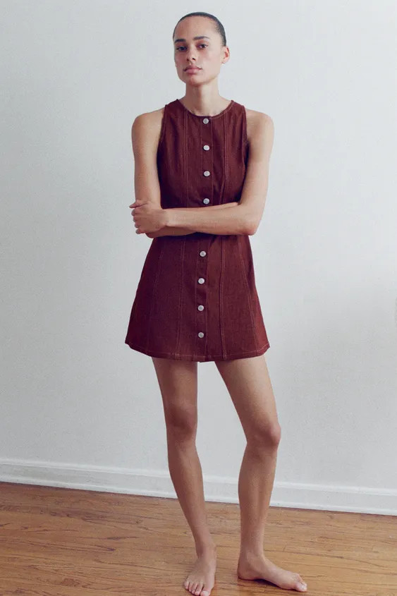 Short sleeveless dress with round neckline. Front metal button closure and hidden side zipper. | Zara US