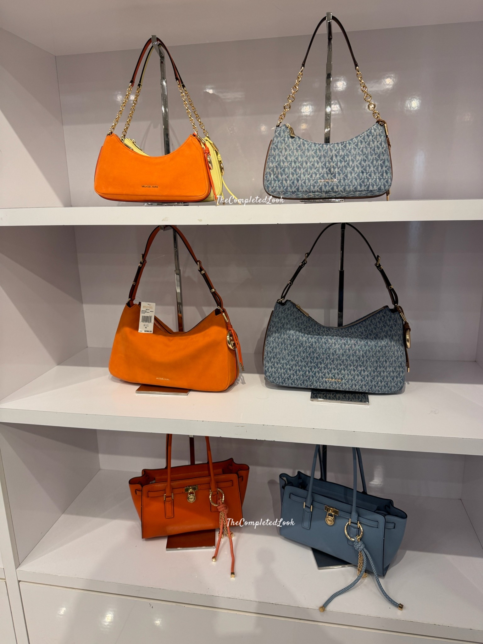That orange is stunning! Michael Kors outlet #springbags #summerbags #michaelkors #orangebag #denimbag