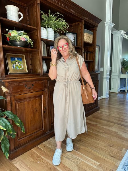 This dress is so good. My only complaint is I did need to steam it out of the package. And you’d probably need to have it in the shower if you traveled with it. It’s going to be perfect for hot weather too. 
Wearing a large. 

Old navy leather bucket bag khaki neutral dress 


#LTKfindsunder50 #LTKitbag #LTKover40