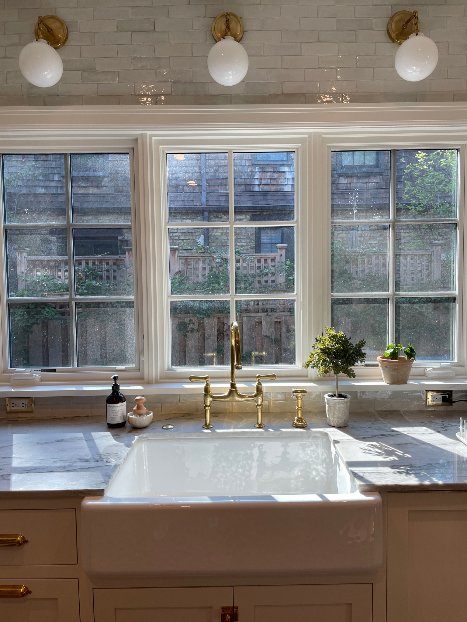 Kohler farmhouse sink, brass faucet

#LTKhome