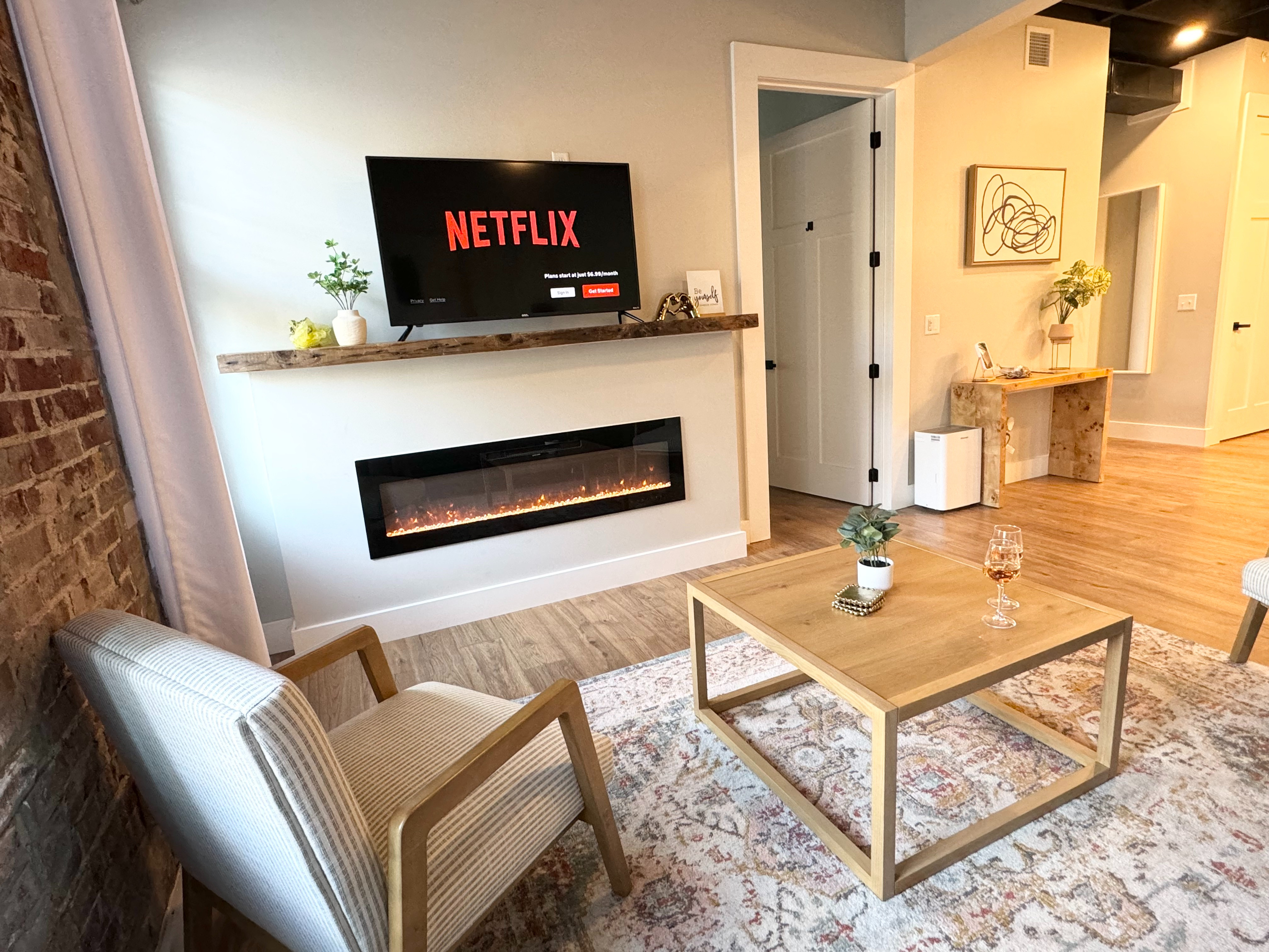 The electric fireplace is ALWAYS a guest favorite! It changes colors & has tons of different heat settings. 

 #LTKHome