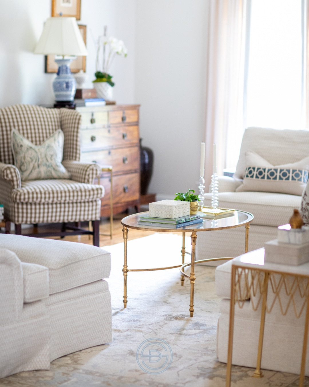 A blend of traditional silhouettes, soft neutrals, and thoughtfully layered textures. This living room design is all about warmth, comfort, and quiet luxury. Every detail works together to create a space that feels both elevated and lived in.

Grandmillennial living room | gold coffee table 

#LTKHome #LTKSaleAlert