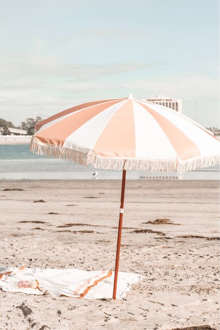 Cutest pink and white umbrella 

#LTKfamily #LTKparties #LTKtravel