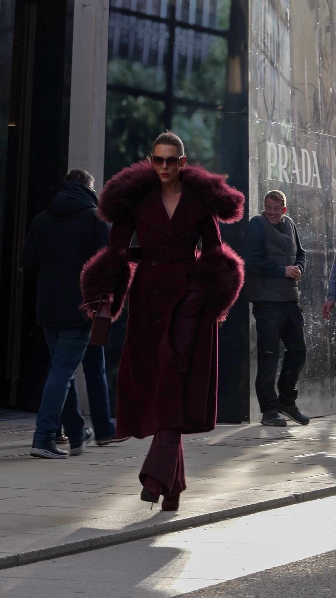 Maroon tailored trousers styled with matching maroon heeled boots for a sleek monochrome look. The outfit is finished with a maroon belted coat featuring luxurious Mongolian style fur on the collar and cuffs. A chic winter outfit idea that is perfect for cold weather, everyday city style, or a polished day to night look. Shop the maroon coat, tailored trousers, and matching boots for an elevated seasonal outfit.

#LTKfestive #LTKwinter #LTKuk