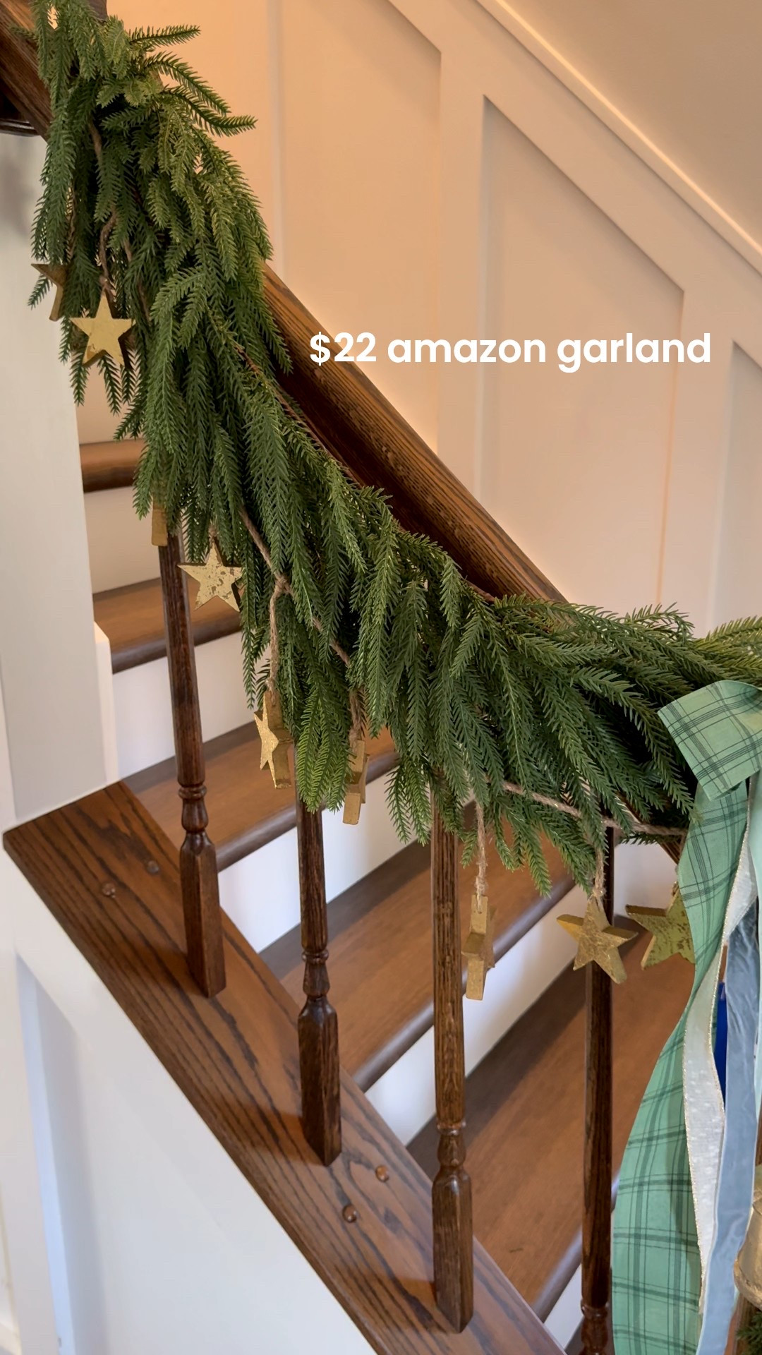 A pair of 6ft garland from Amazon for only $22.  This is doubled up here with both. 

The ribbon, bells and star garland all came from hobby lobby in store 

#LTKHome #LTKHoliday