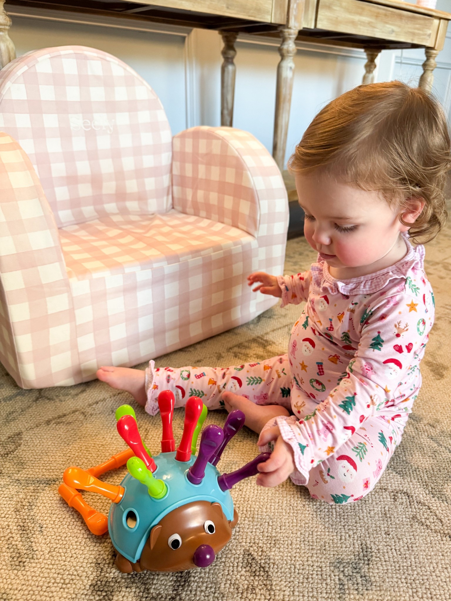 These Christmas pajamas are so soft & cute ✨from Cecil and Lou but linked similar 
She’s loving this chair from nestig (linked similar) and hedgehog toy from Amazon 

#LTKKids