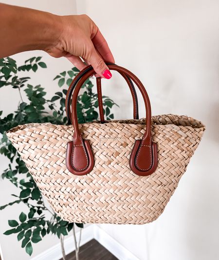 This small straw bag is the cutest little tote to wear this Summer! 😍

#LTKFindsUnder100 #LTKStyleTip #LTKItBag