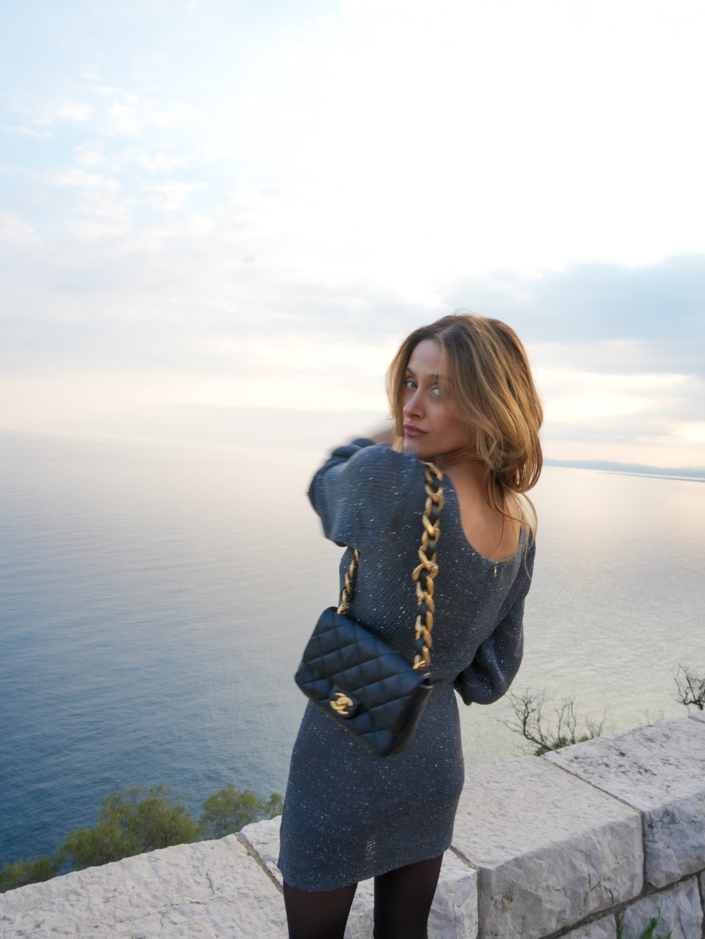 If I had to define my French Riviera evening style in one look, it would be this.
A shimmering mini dress, black boots, vintage Chanel, and that soft sea light just before sunset.

#frenchrivierastyle #springoutfitideas #chanelbag #shimmerdress #datenightoutfit

#LTKspring #LTKpartywear #LTKdatenight