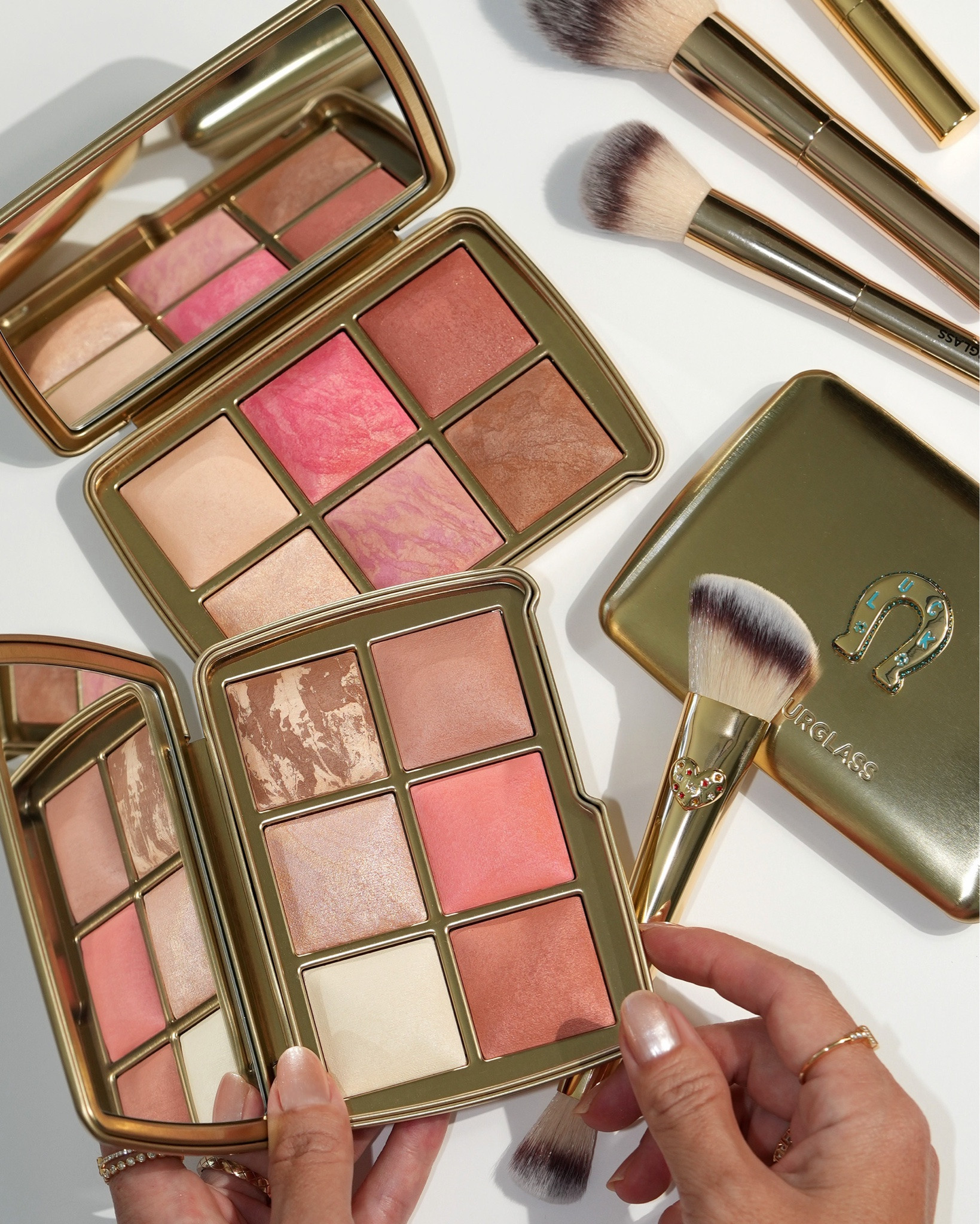 The @hourglasscosmetics Holiday Ambient Lighting Edit Unlocked Palettes have arrived! I picked up three of this year’s palettes and they are SO beautiful. Swipe through for a closer look + swatches.

WISH
HOPE
LUCK

There are 15 new shades across these three palettes this year! I’m still testing everything, but I put Wish to the test on my medium tan skin and I’m really impressed with this one so far. For shade reference, I wear the Veil Hydrating Skin Tint in Shade 9 or 10.

Let me know which palettes from previous years you want to see compared and I’ll try to include them in my blog review coming soon!

There are a few other beautiful sets that just launched. And now I need to know: do I need the Sephora-exclusive Love palette too? This one also has some new colors!