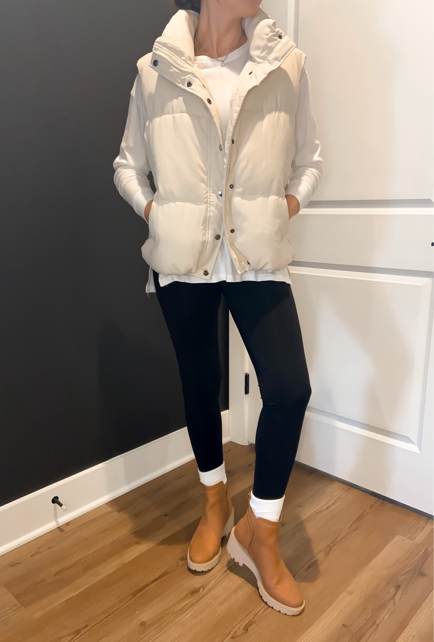 Puffer vest and Chelsea boots outfit