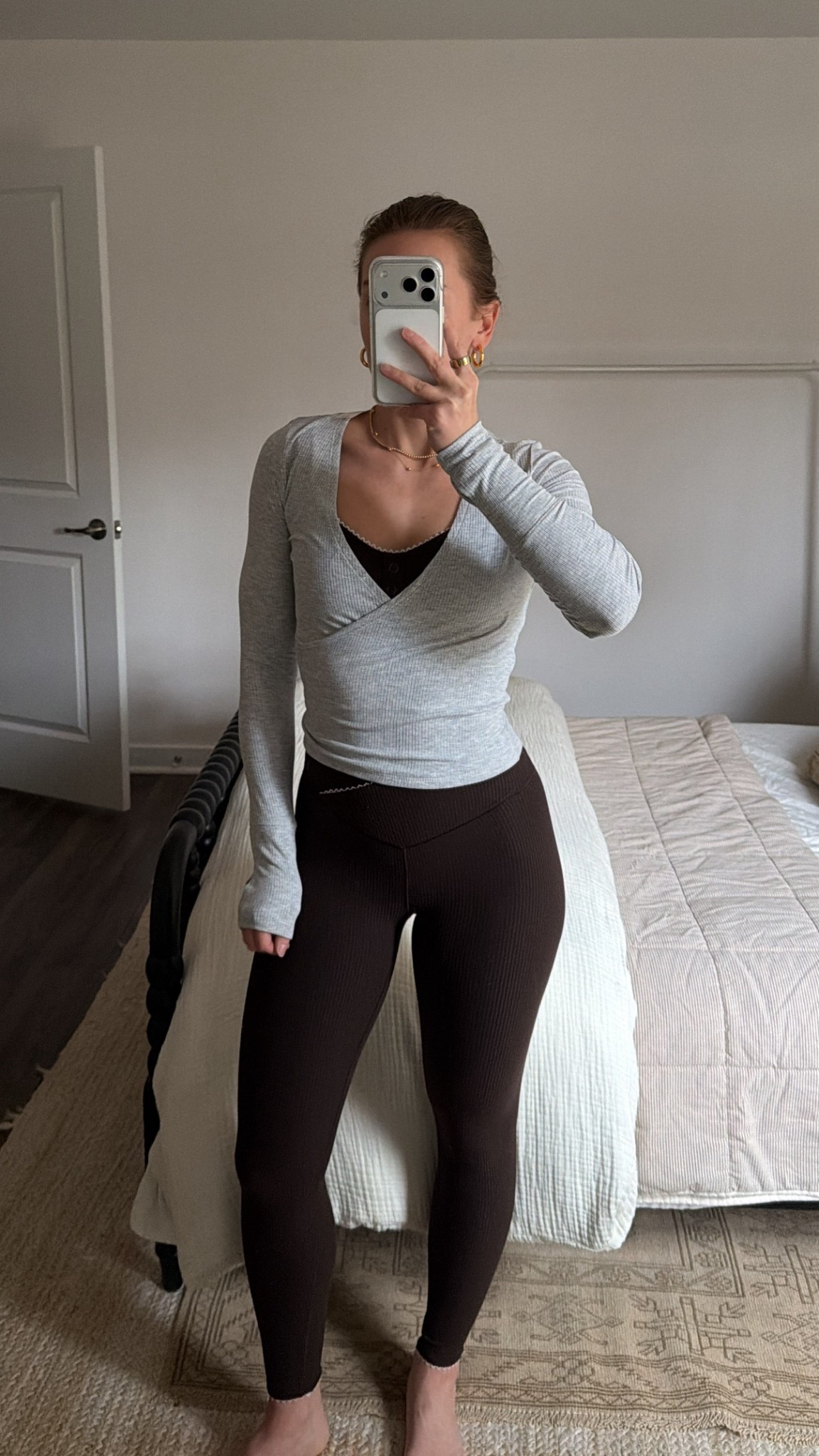 1/9/26 Same aerie activewear set in chocolate brown 🤎 paired with their grey long-sleeve wrap top for layering. Wearing size XS in the top and bottoms of the set, and size S in the wrap top. Super flattering, cozy, and perfect for workouts or everyday wear.

#LTKfitnessgoals #LTKootd #LTKActive