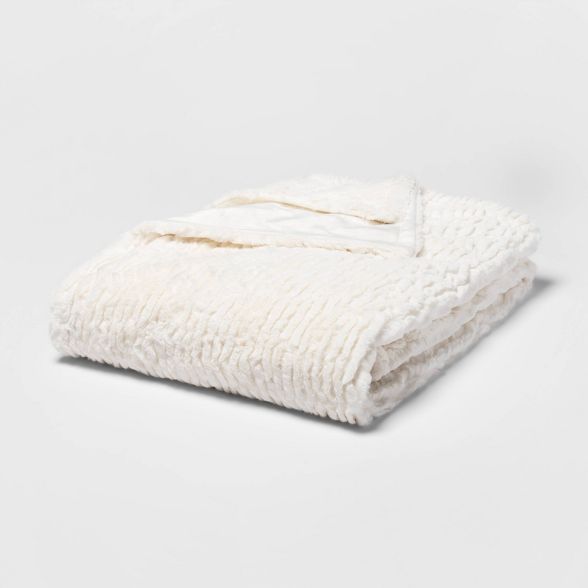 55" x 80" Cut Faux Fur Solid Bed Throw Cream - Threshold™ | Target