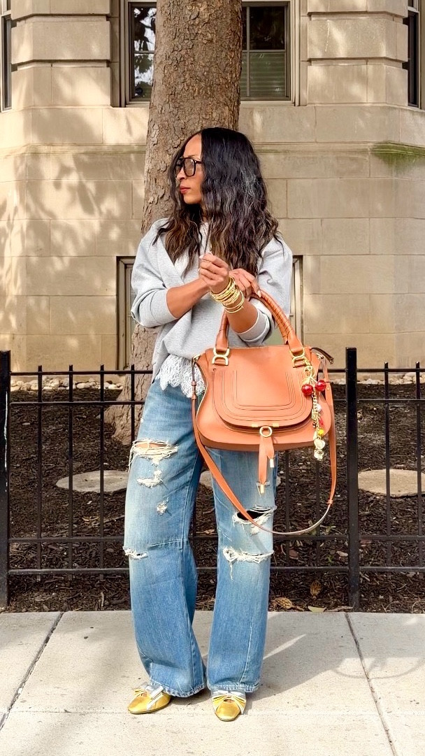 This is how I make basic outfits feel more styled.

It’s always about contrast… the lace detail paired with the two tone metallic bow detail kitten heels completely changed the feel of this look.

Comment OUTFIT and I’ll send you the details 🫶🏽

This is a casual outfit styled with distressed jeans and a sweatshirt elevated with lace detail and two tone metallic bow detail kitten heels to create a more polished and styled look