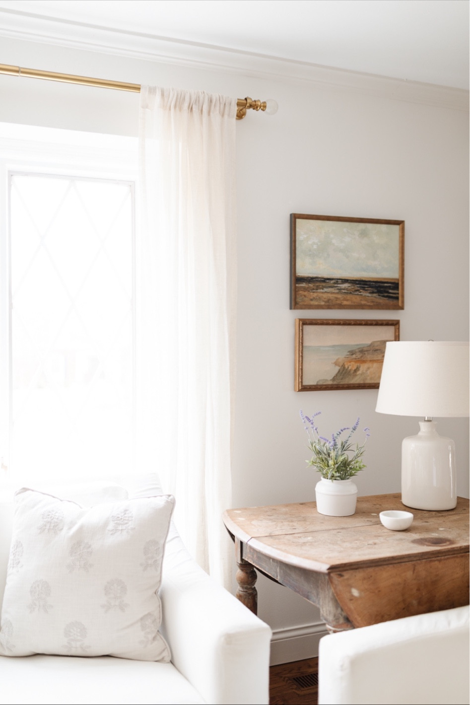 Living room fall decor with a table lamp, marble bowl, wall art, and wood table. Living room fall, living room decor, guest room decor, cozy home decor, guest room inspiration, living room inspiration.

#LTKhome #LTKstyletip #LTKSeasonal