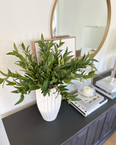 New home decor from the hearth and hand collection and threshold lines at target! I used seven of these seated willow stems in this arrangement. My round brass mirror is 34 inches. 

#LTKhome #LTKsalealert #LTKstyletip