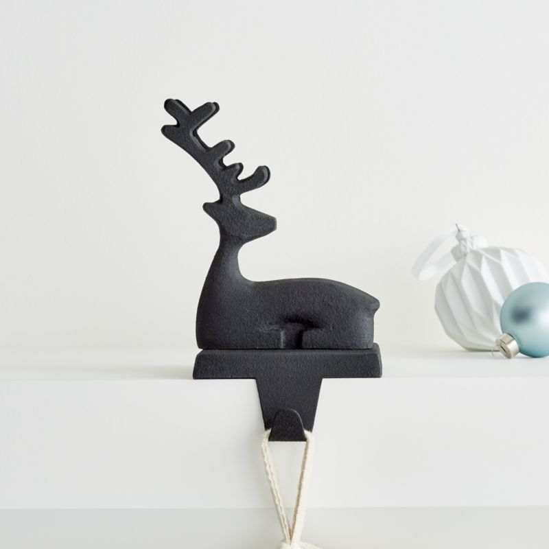 Zinc Sitting Reindeer Christmas Stocking Hook + Reviews | Crate and Barrel | Crate & Barrel