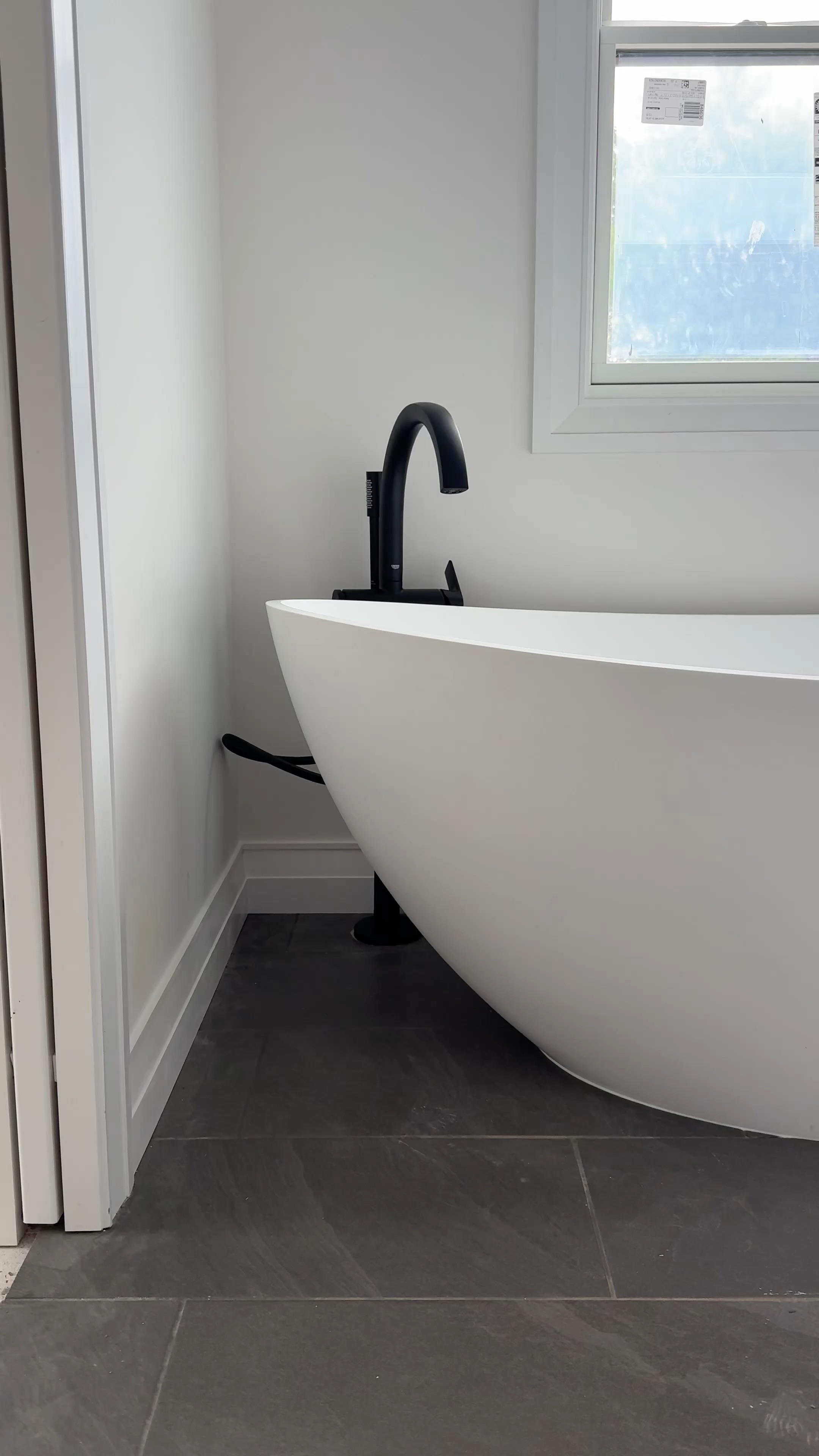 There's nothing like a relaxing soak in this stunning freestanding tub. It’s the perfect spot to unwind after a long day, adding a spa-like touch to the bathroom.

#LTKHome #LTKxWayfair #LTKVideo