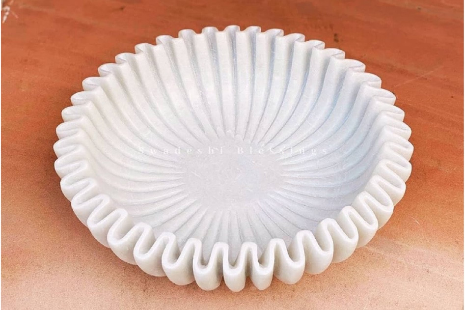 Love this catch all for our entry east way. Similar to the CB2 scalloped edge bowl but $200 less! 

#LTKfindsunder50 #LTKhome