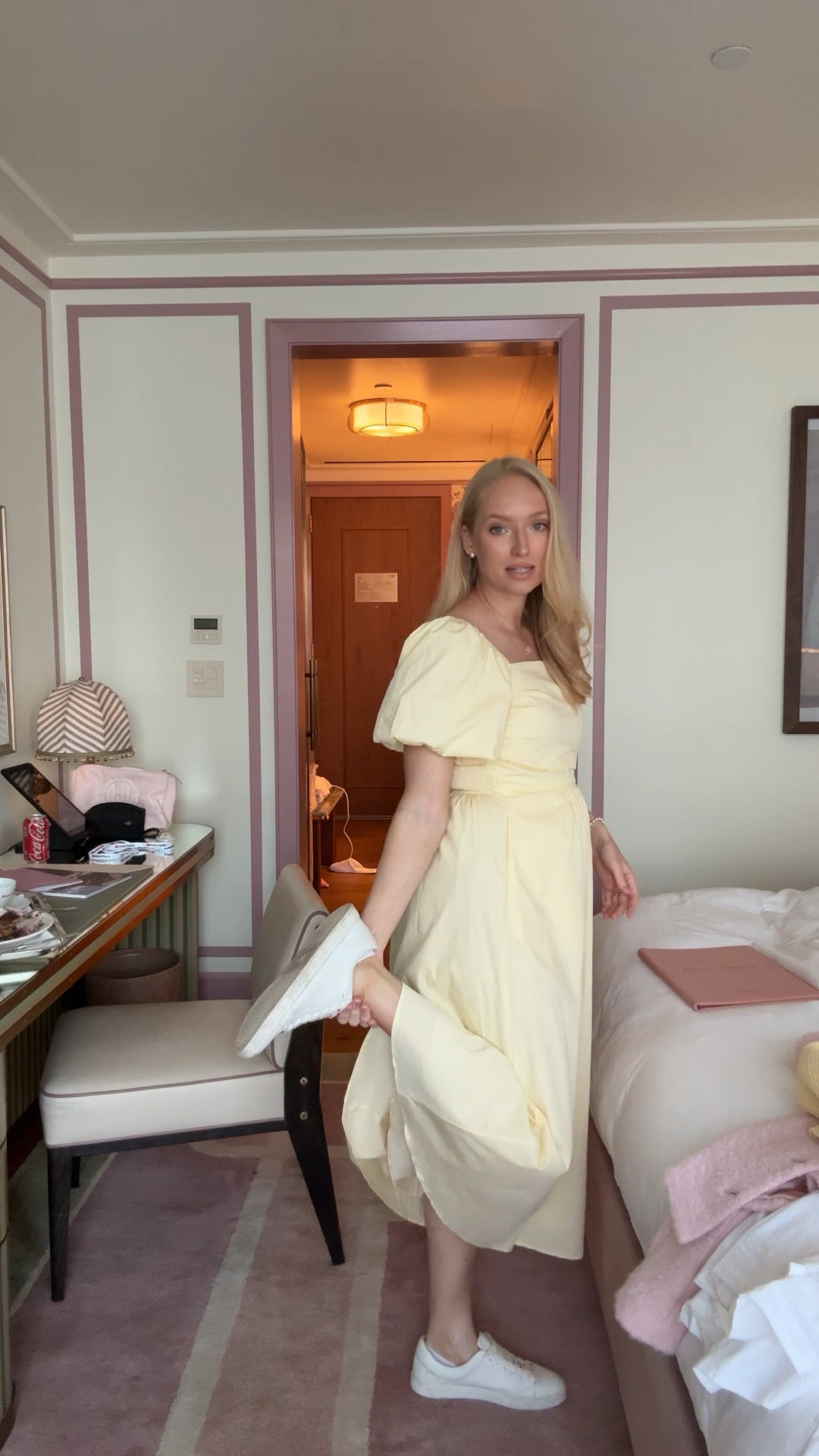 What I wore for a shopping day in New York City! I’ve been loving butter yellow this season - I also wore this dress on Easter! It’s bump friendly and you can also wear it off the shoulder. I’m wearing a size medium but it’s a tad roomy in the chest so if between you can go with the size down. Use code STRAWBERRYCHIC20 for 20% off! Also linking my go to white sneakers.. I walked almost 11 miles in this outfit today! I ended up adding a headband because it was windy  

#LTKSeasonal #LTKBump