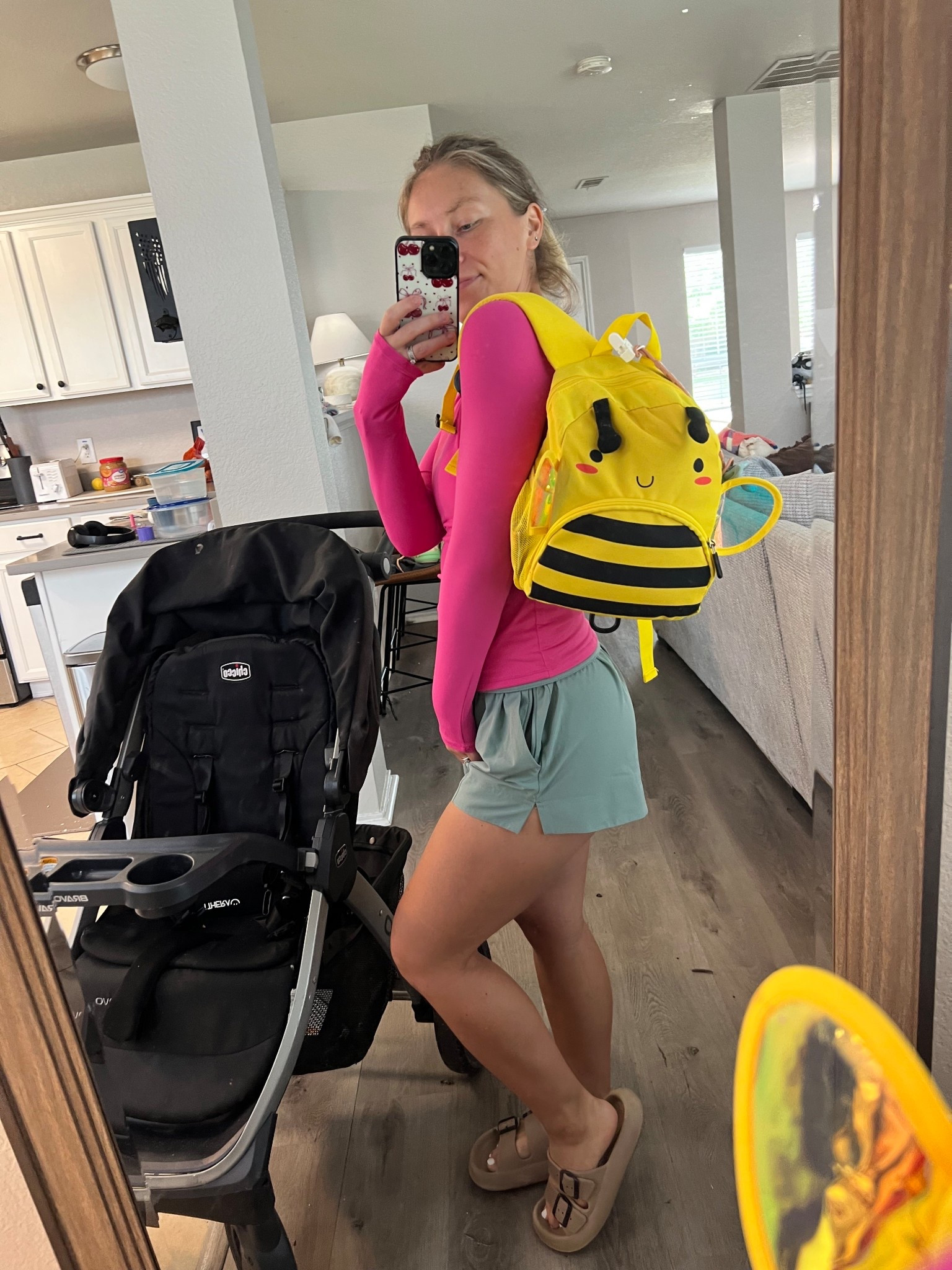 Hot pink long sleeve + sage green running shorts = my new favorite mom-on-the-go outfit 💗☀️ Perfect for swim class drop-off, errands, or just surviving summer in style. Amazon cloud slides for that comfy walk, and yes, I’m rocking my toddler’s bumblebee backpack because… mom life 🐝 Athletic outfit, everyday wear, cozy mom style — this is it.

#LTKActive #LTKStyleTip #LTKItBag