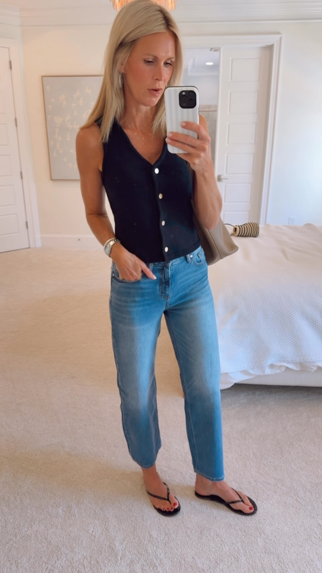 If you've been curious about trying the barrel jean trend but don't want anything too dramatic, these are the pair I'd recommend. 🤍 They're such a subtle take on the trend, the wash is perfect for summer, and they're incredibly comfortable.

I paired them with this sweater tank with the prettiest gold button detail and finished the look with the viral Quince bag. Such an easy outfit that looks so much more expensive than it is. #QuincePartner @Quince 

Quince, barrel jeans, sweater tank, viral tote bag, affordable fashion, everyday outfit, summer style, elevated basics

#LTKootd #LTKmomlife #LTKSeasonal