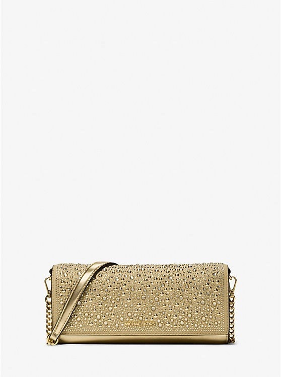 Sparkle in style with the Jet Set Medium Metallic Leather Clutch from Michael Kors! This clutch is ON SALE and is under $80.

Keywords: Holiday party, holiday clutch, holiday handbag, crossbody bag, Michael Kors, gifts for her 



#LTKSaleAlert #LTKFindsUnder100 #LTKHoliday